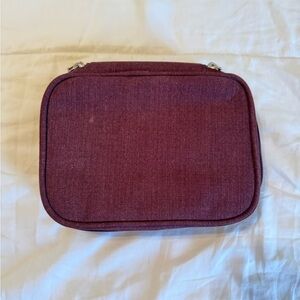Bagallini tri-fold hanging cosmetic case.